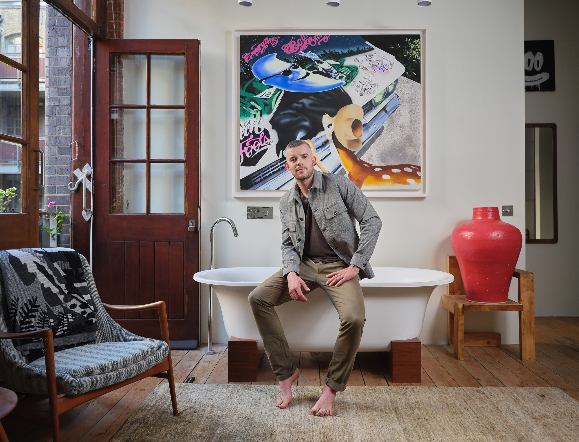 Russell Tovey with his art collection. (Copy)