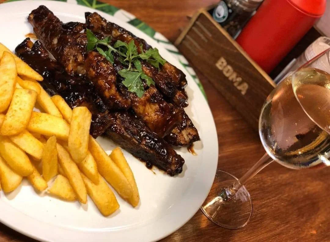 The only thing that could make our fall-off-the-bone, sweet and sticky BBQ pork ribs any better is ordering them with a side of cheesy garlic fries, smothered in a rich, cheesy garlic sauce. Cooked to perfection in our wood-fired pizza oven.

These r