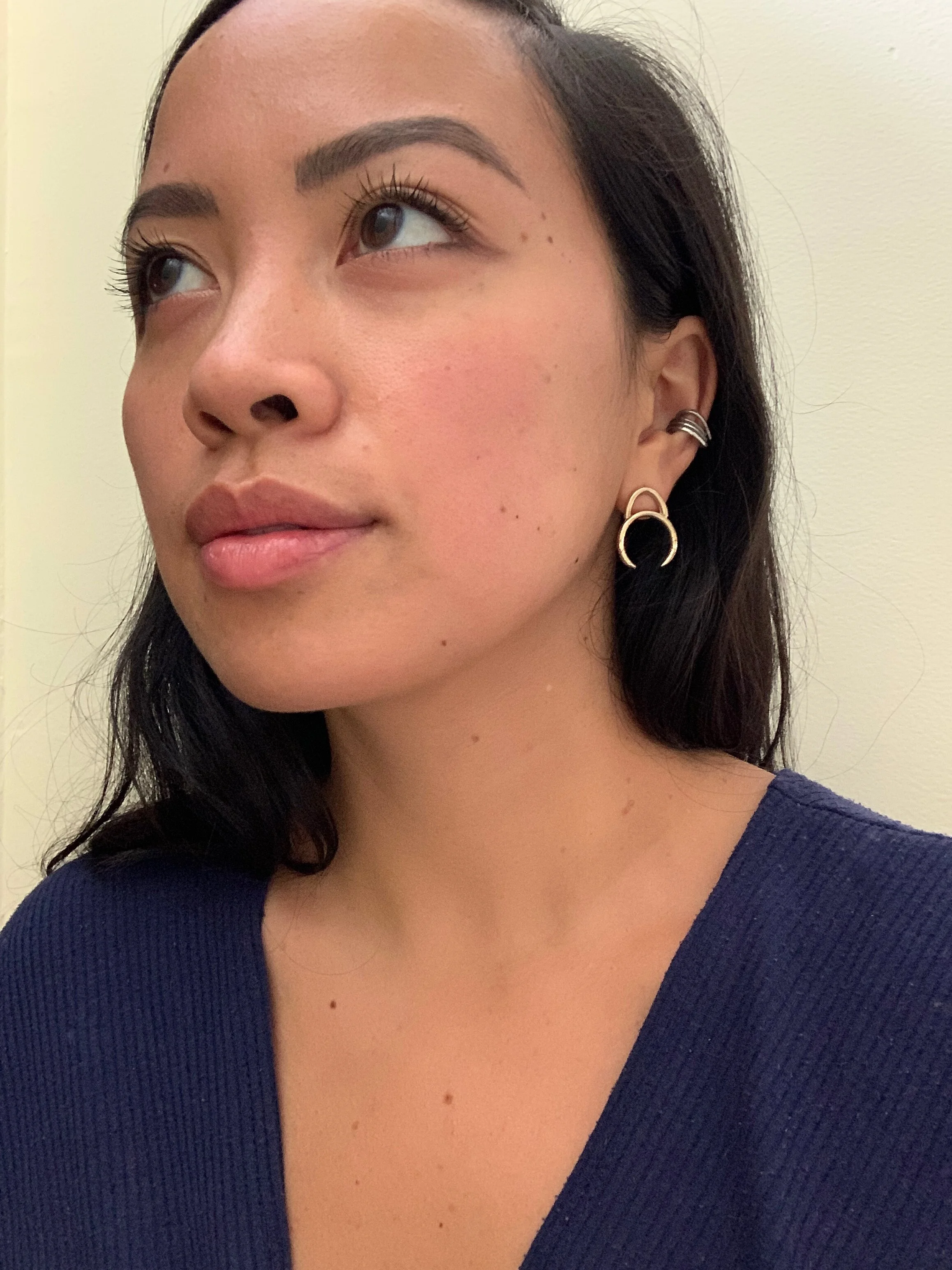 woman modelling cast bronze eclipse earring (Copy)