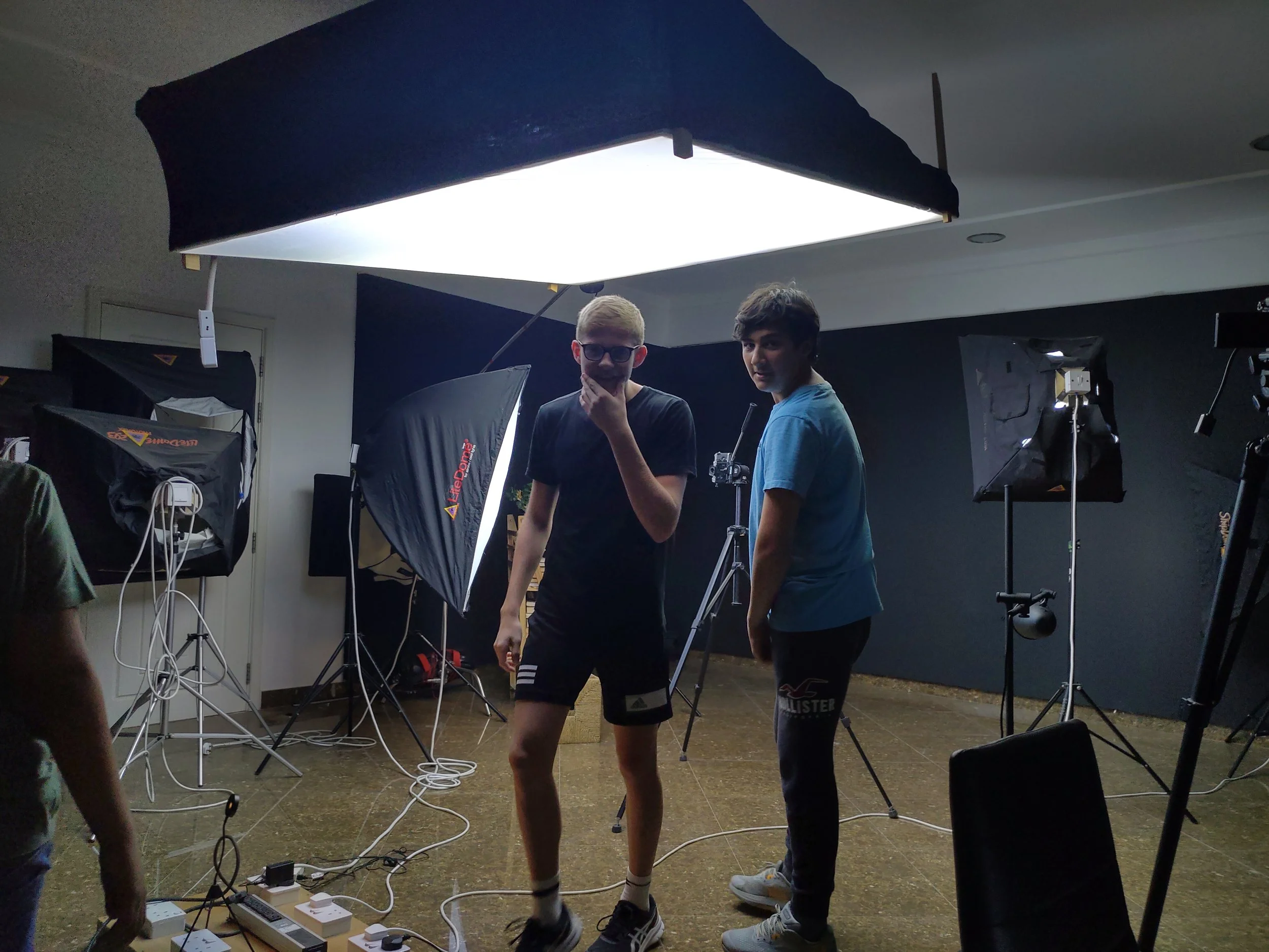 Students in a photography studio learning about creative careers — TeachBahrain career development
