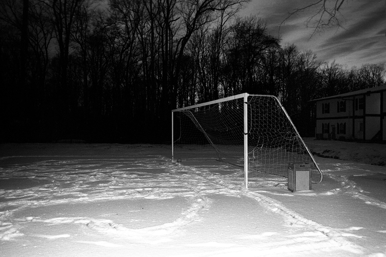 Soccer field on a snowy night, 2014.