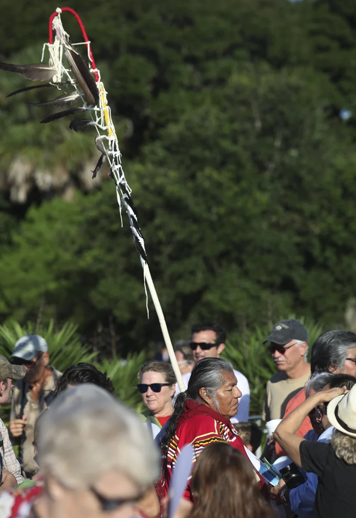 Billie stands with Resist 450 at St. Augustine's Mission Nombre de Dios. Photo courtesy of Walter Coker. 