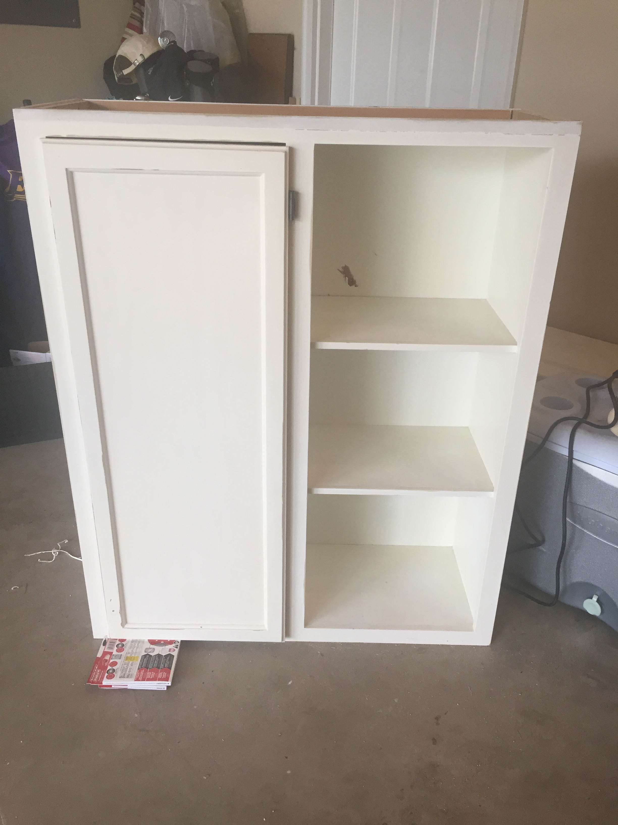 First, I patched a hole with some wall putty.
