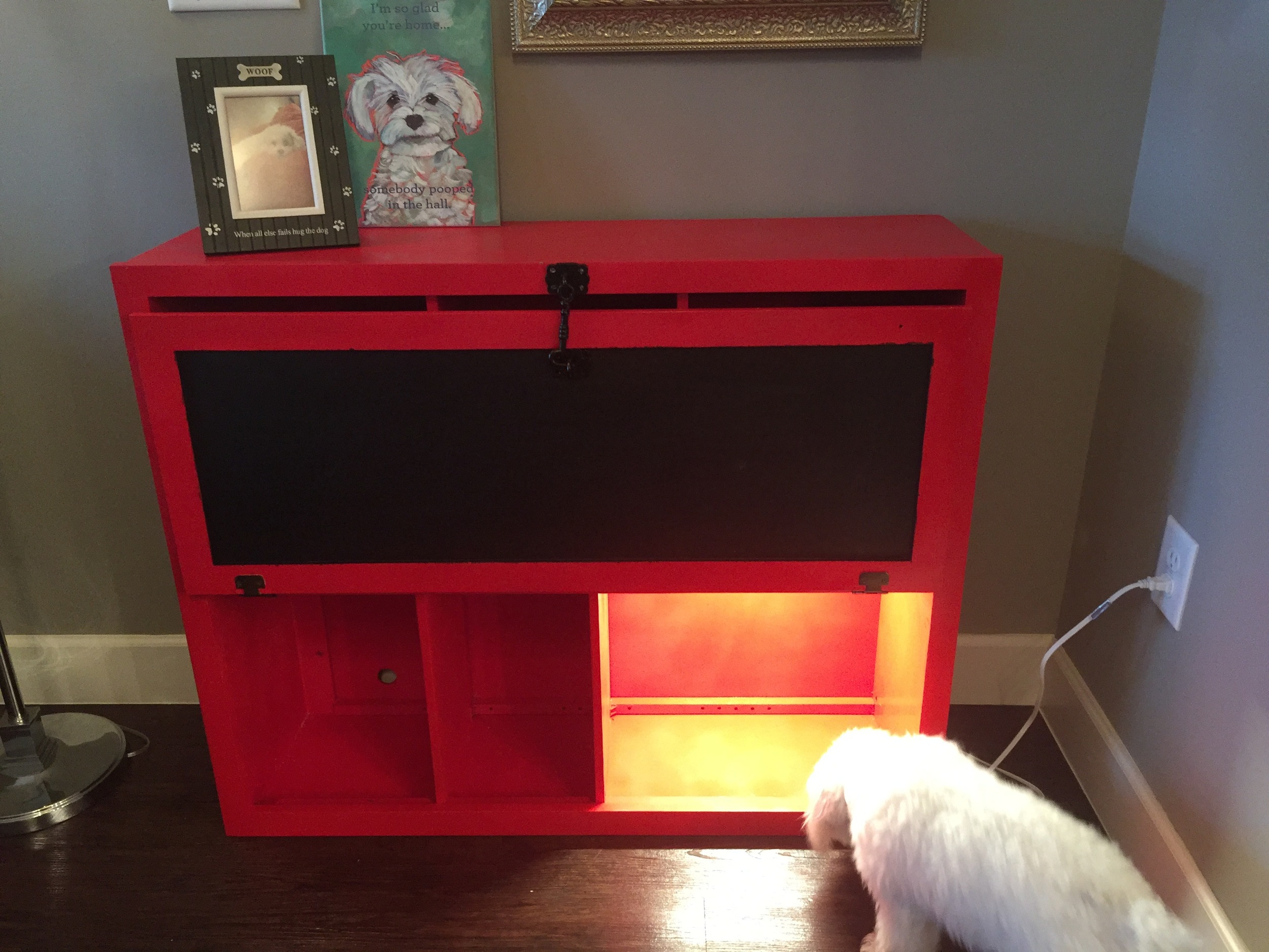 I reattached the door and added a hook and eye latch in order to easily keep the door open or shut. I also painted the back of the cabinet door with chalk paint so we could write sweet messages to Beasley ( she definitely knows how to read ). 