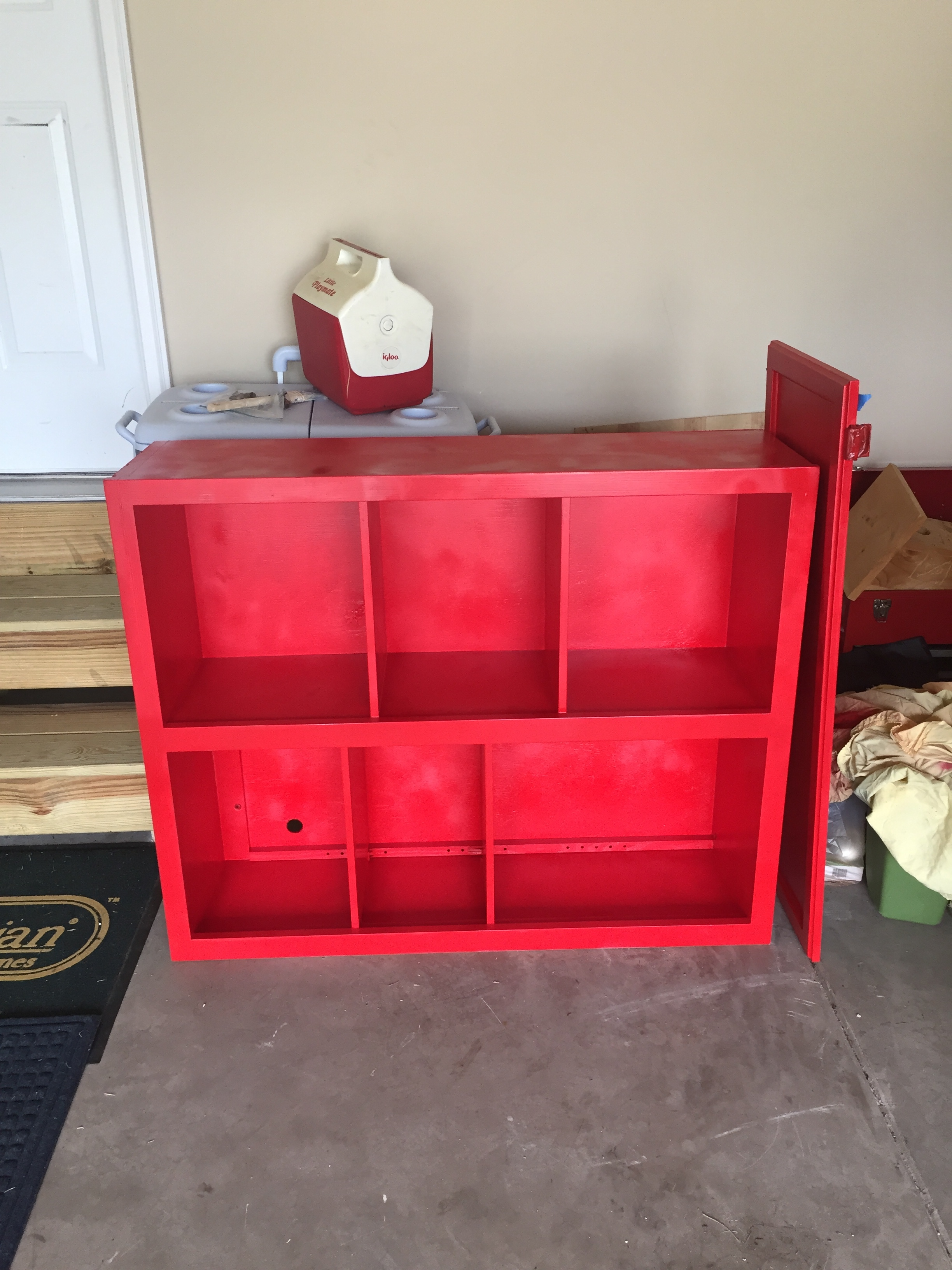 This was after applying two coats of Apple Red Rust-Oleum Painter's Touch Ultra Cover 2X . Not too pretty. I ended up applying 4-5 coats of spray paint to give it that extra glossy touch. 