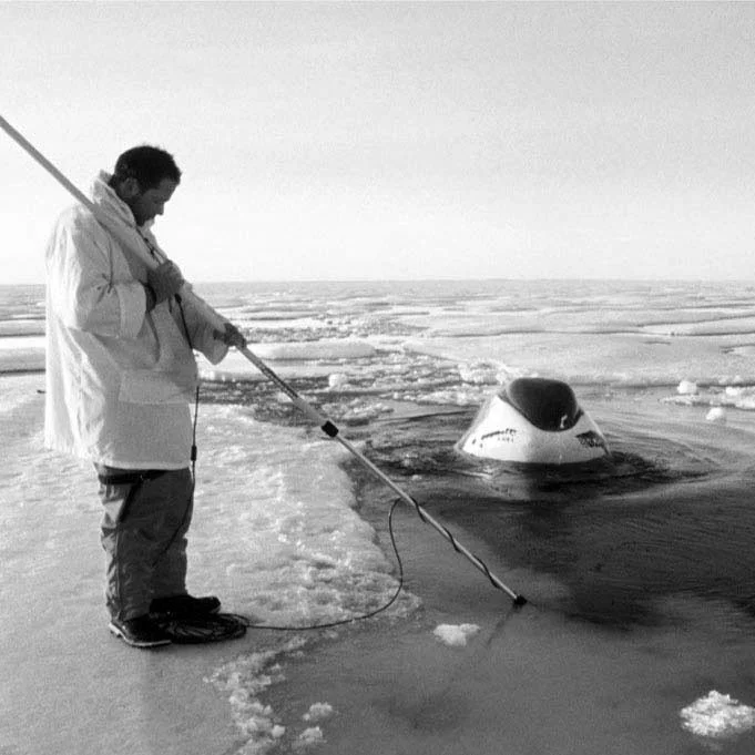 Ian on ice with Whale LR.JPG