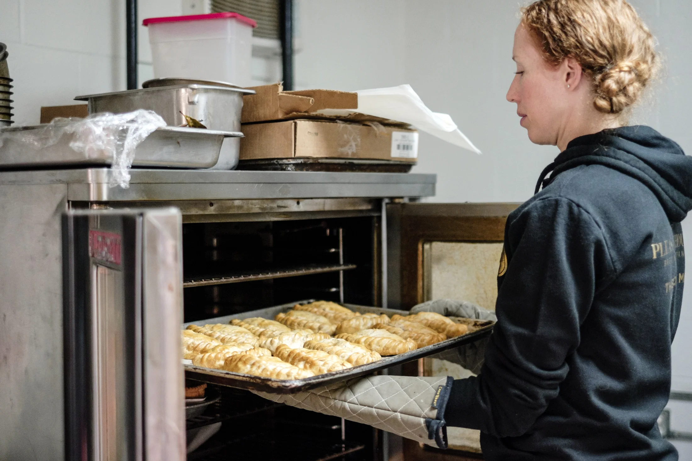  Chelsea takes out freshly baked pasties.&nbsp; 