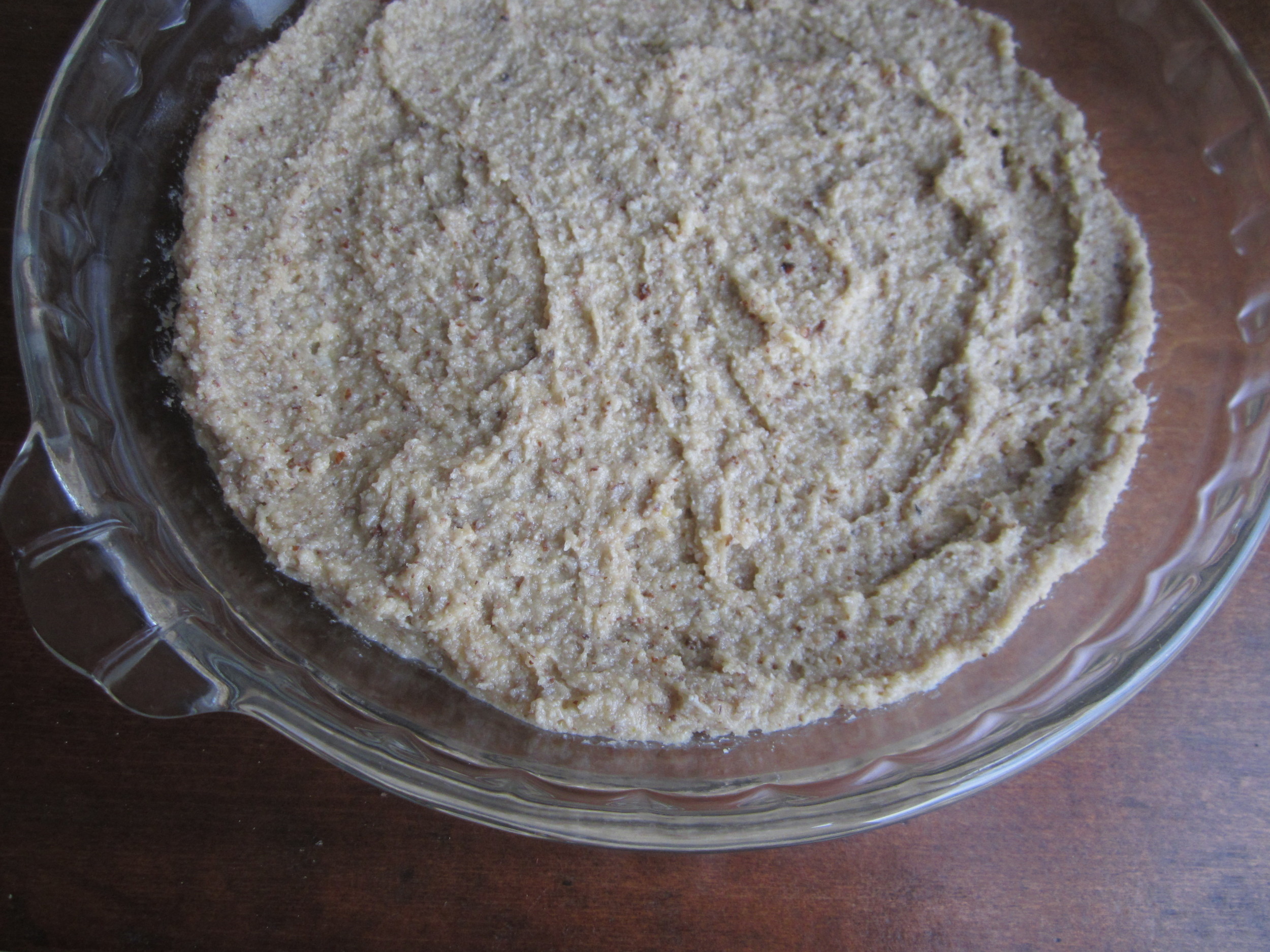 This recipe is sized for a deep-dish pie pan. The filling probably will not fit in a smaller one.