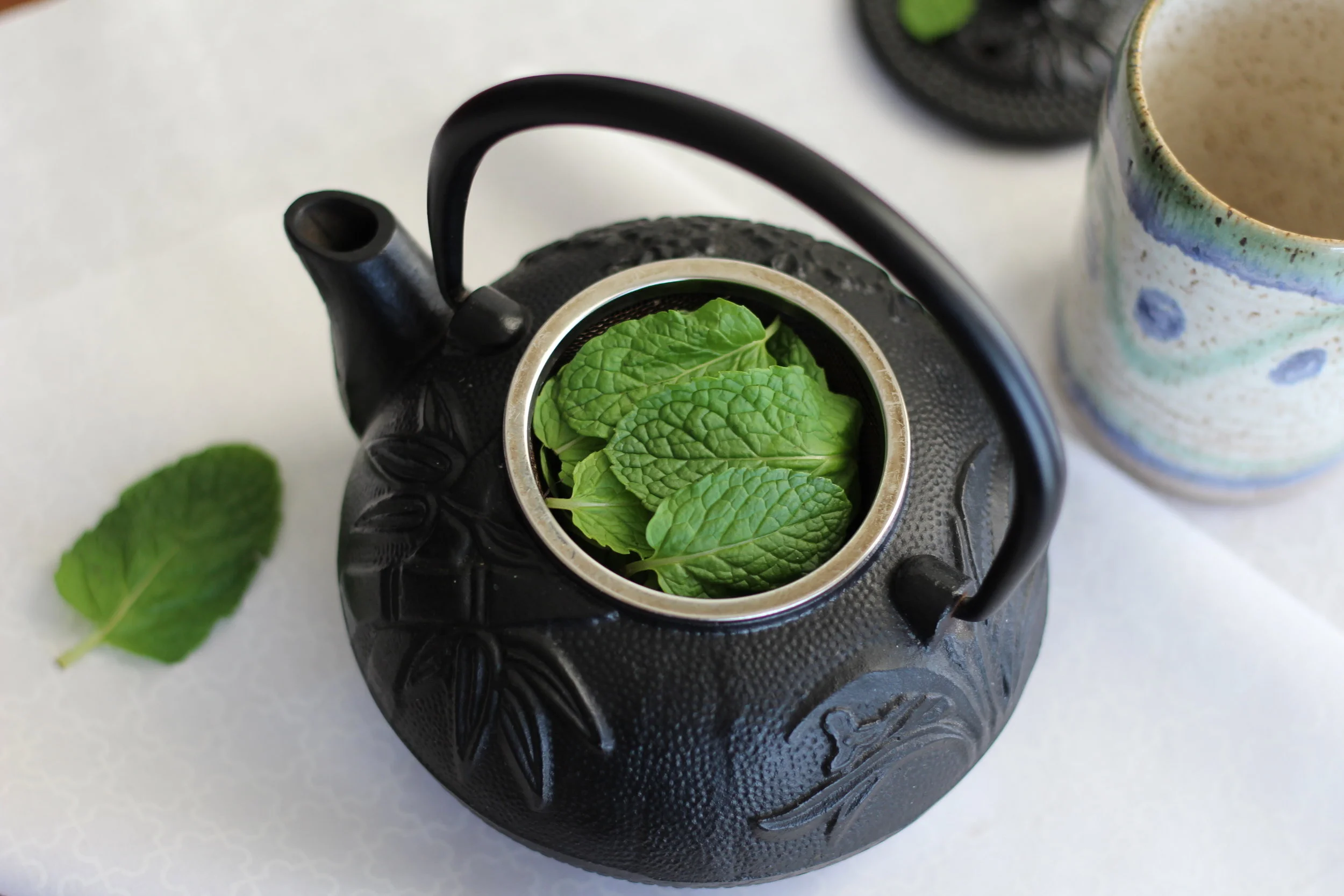 Mint tea is a good low-FODMAP beverage choice. I'm not sure exactly what variety of mint these leaves are, but they tasted great. I purchased them at the local asian market for a spring roll recipe, and made tea with the leftovers.