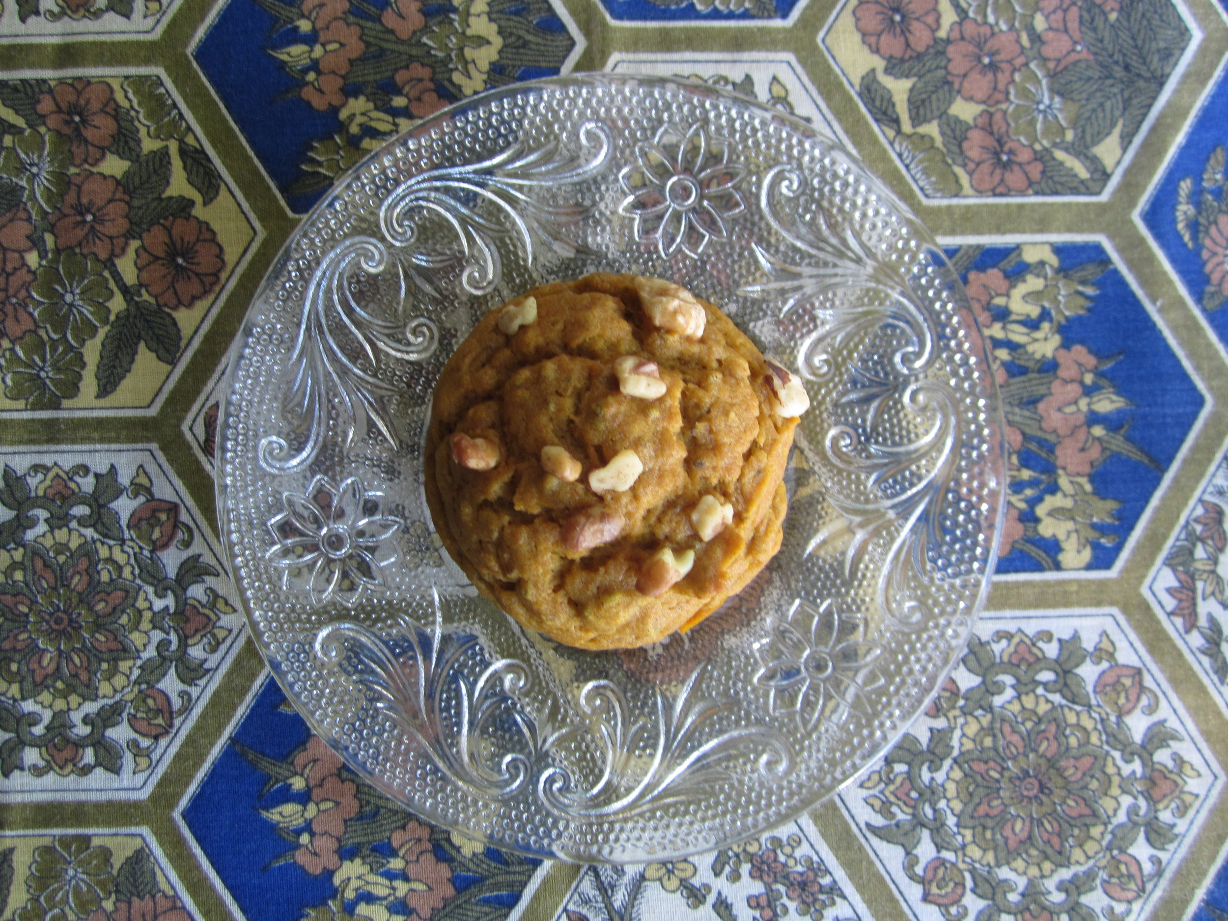 Give your pumpkin muffins a crunchy walnut topping, or sprinkle with coarse sugar crystals for a nut-free version.