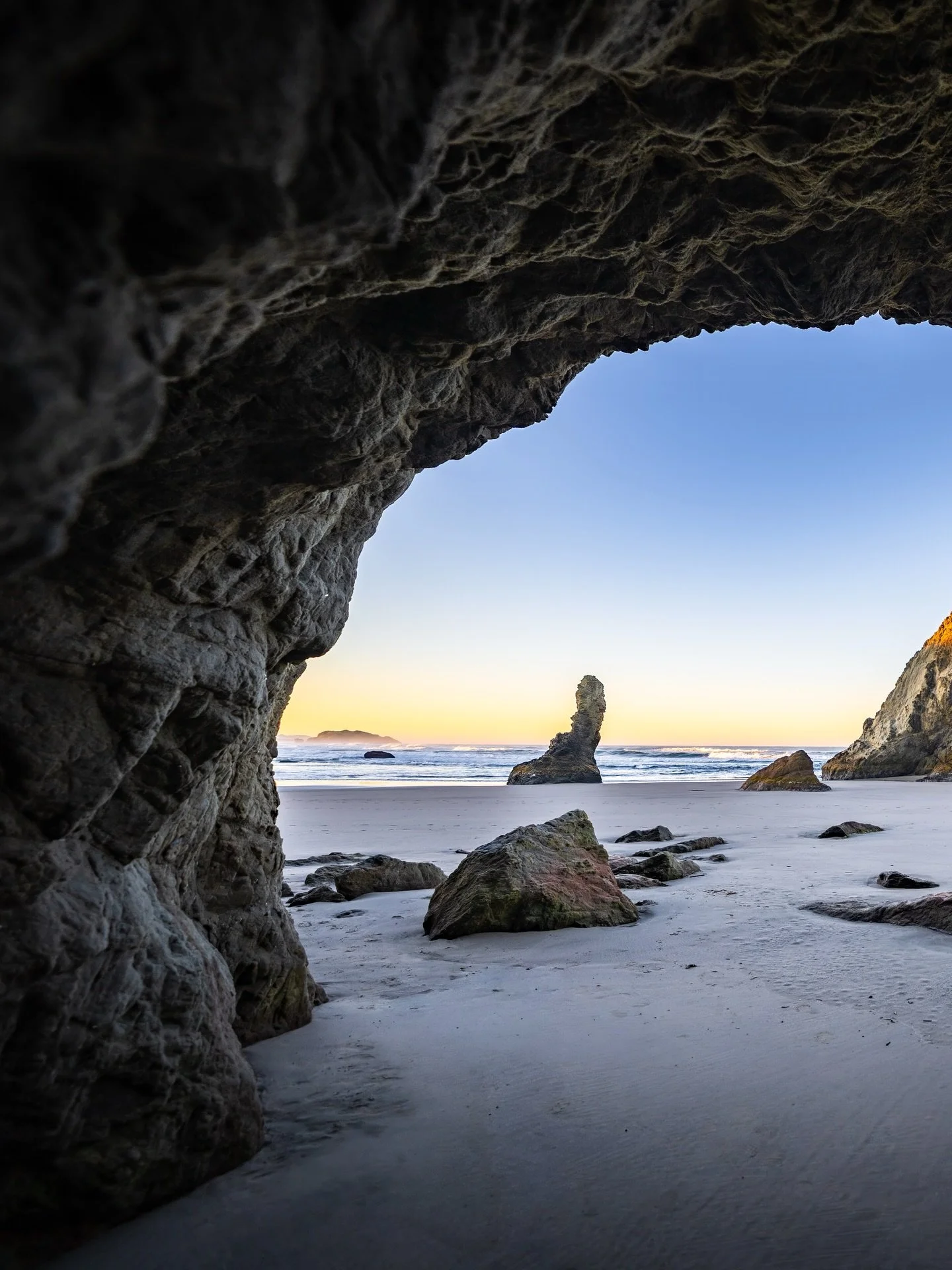 THE WILD has always been where my heart speaks clearest.
Standing at the edge of the ocean, framed by stone, with open light ahead and the tide slowly rewriting the sand, I lose myself in thought.

Out here, I think of my little family and our spirit
