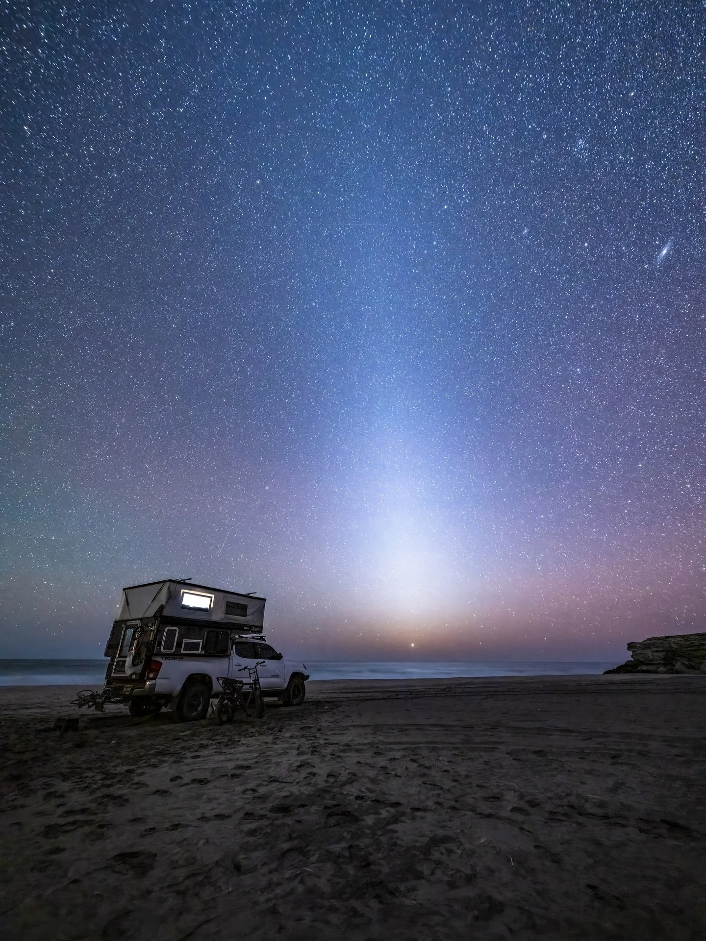 IN TRULY dark places where human noise finally fades, you can see a pale wedge of light stretching along the ecliptic. This is zodiacal light, the reflection of sunlight off a vast cloud of interplanetary dust. For a moment, you&rsquo;re not just sta
