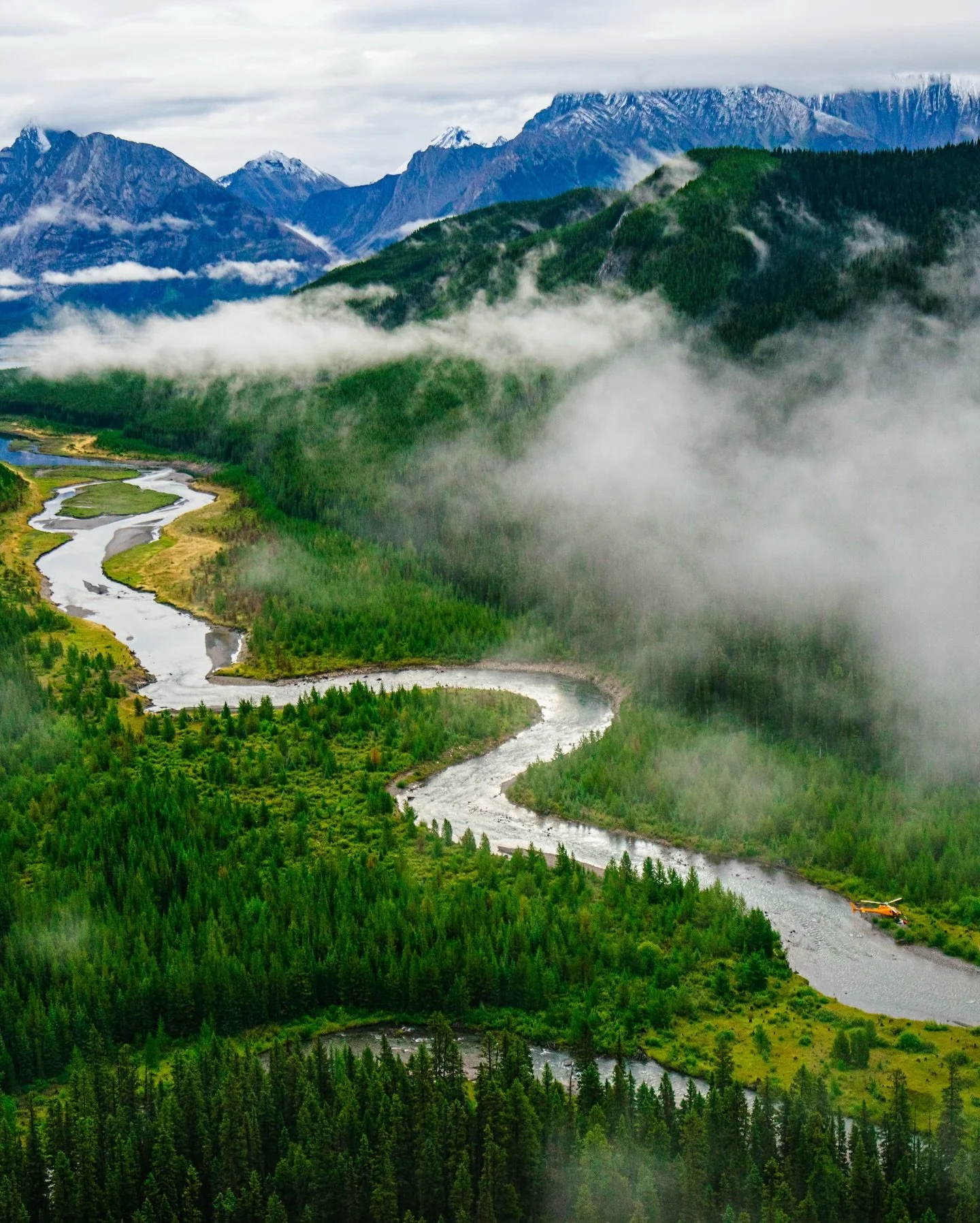 EARLY mornings like this start with a quiet kind of anticipation.

Lifting off in a helicopter while the world is still half asleep. Cold air. Low clouds drifting through the valleys. The mountains slowly waking up.

You never really know what you&rs