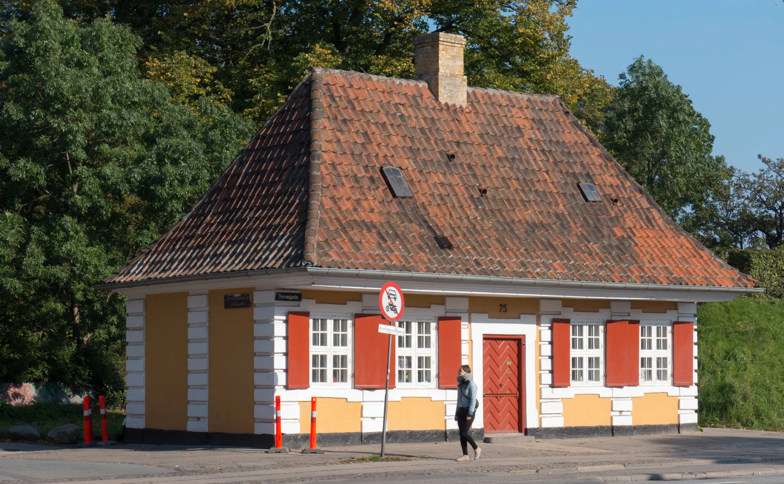 On the east side of Torvegade, just inside the south embankment, is the Customs House built in 1724 on the city side of Amagerport.