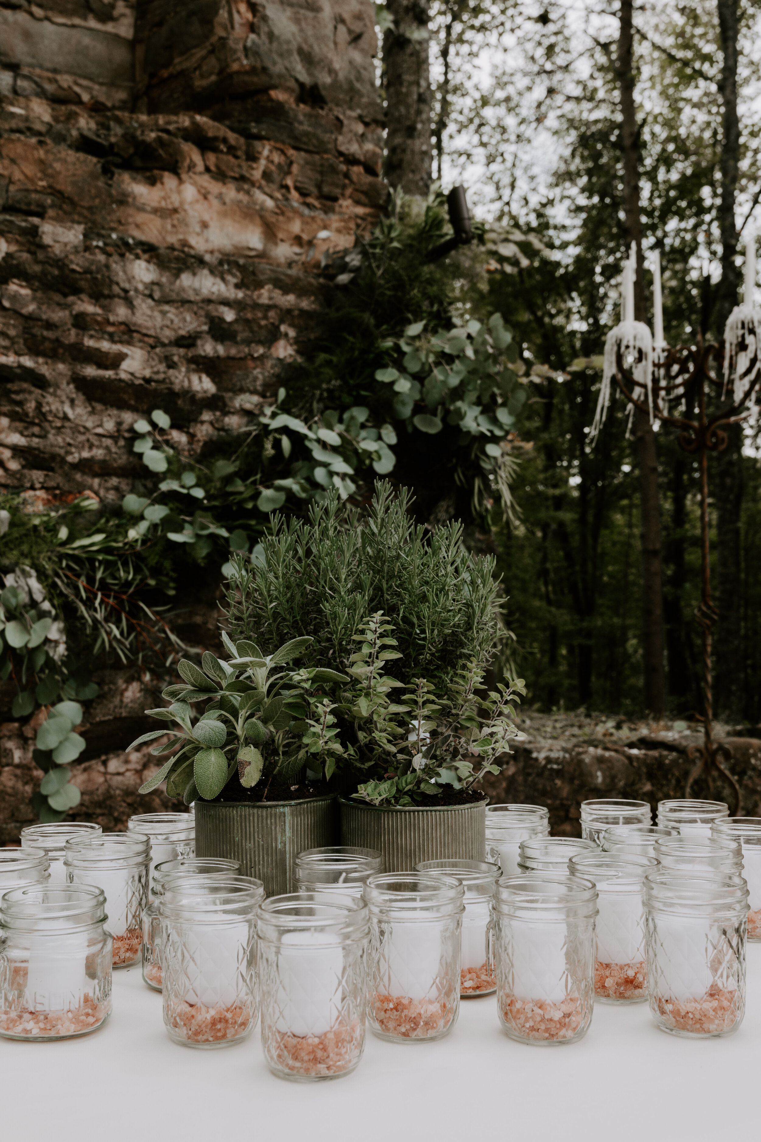 North GA wedding reception herbs and essential oils as centerpiece