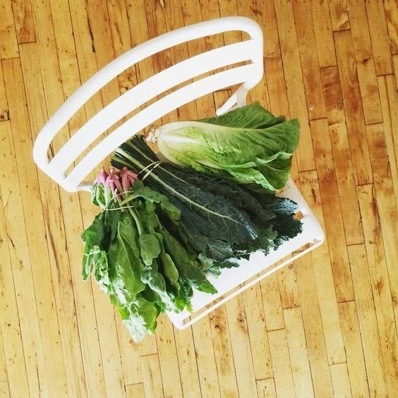 Fresh greens in a market basket