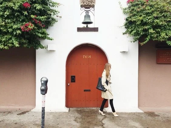 Saffron and Sage Woman Walking by Door