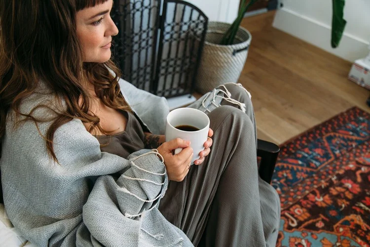 Wrapped in a blanket with a warm mug