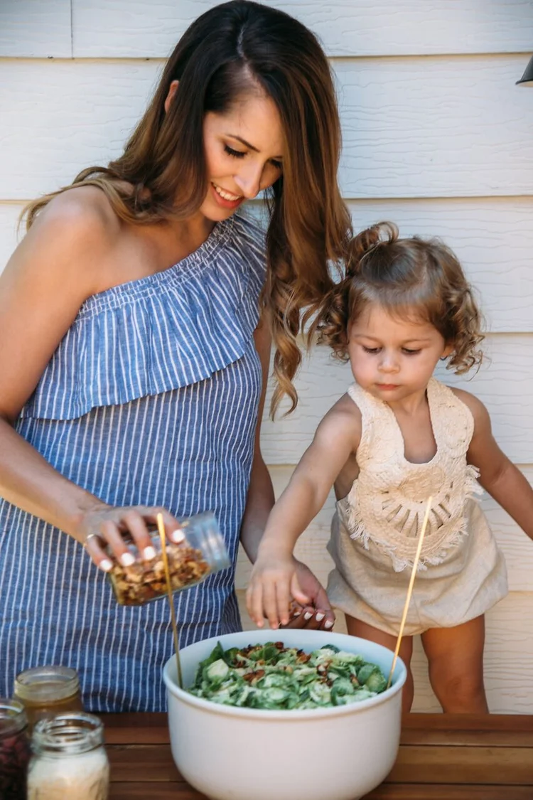 A mother and child cooking together
