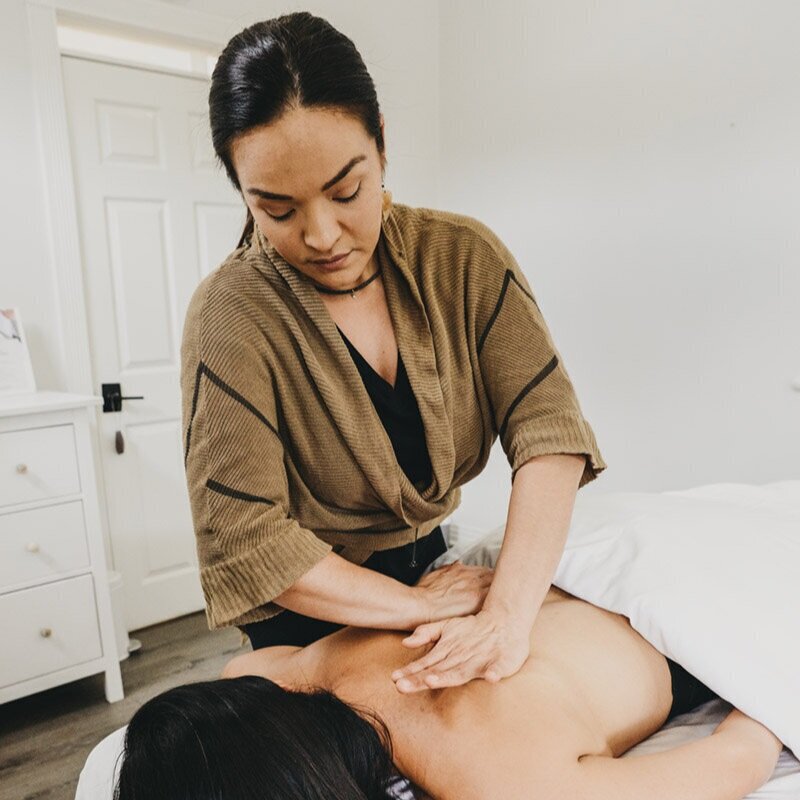 Massage therapy session at Saffron & Sage