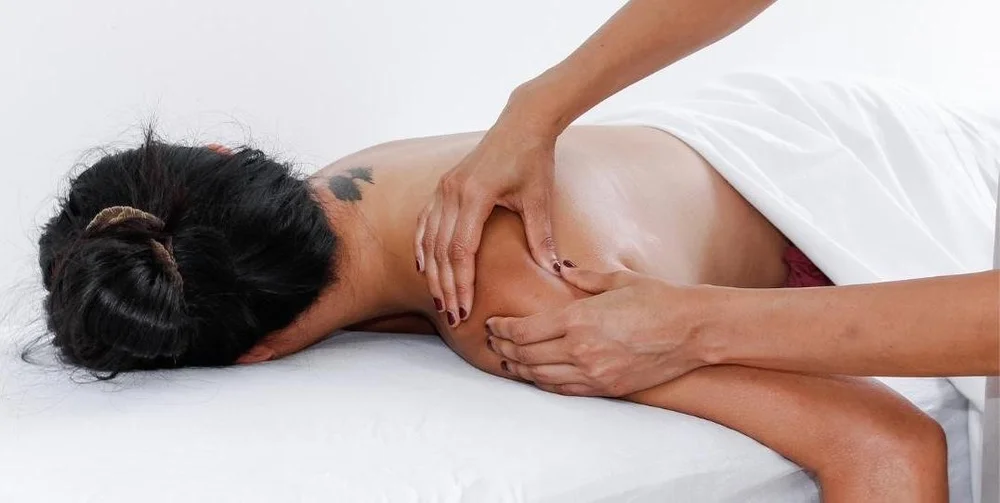 Massage therapy session at Saffron & Sage