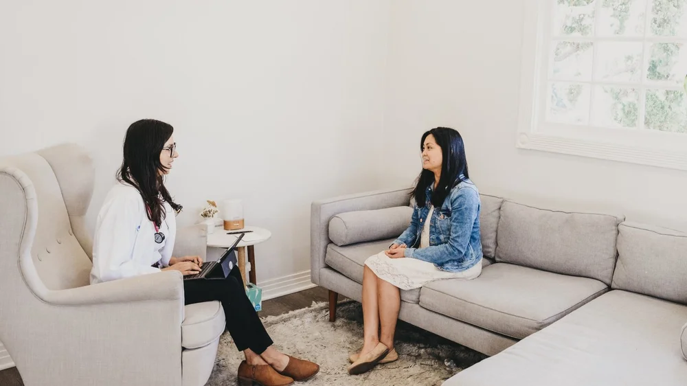 A one-to-one session in a quiet room at Saffron & Sage