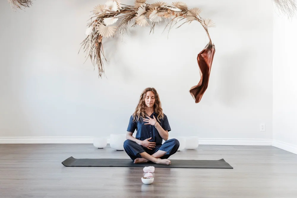 Seated breathing practice in the studio