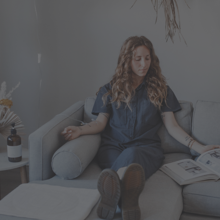 Person receiving nutrient injections through IV therapy