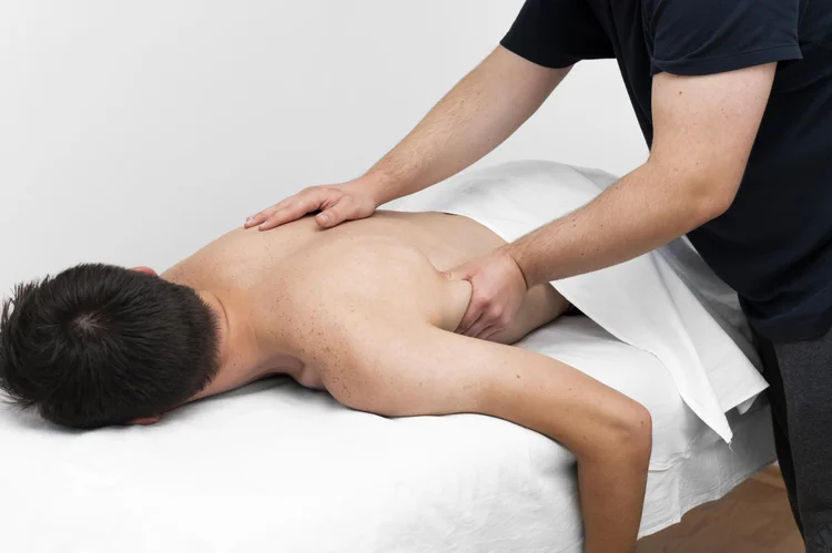 A man receiving a back massage