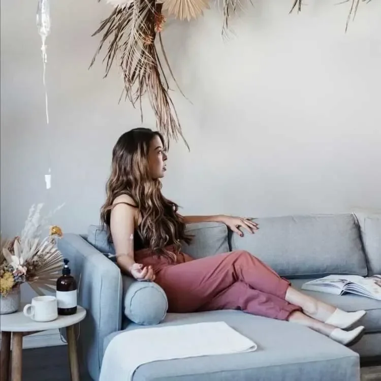 Relaxing on the lounge sofa with a coffee