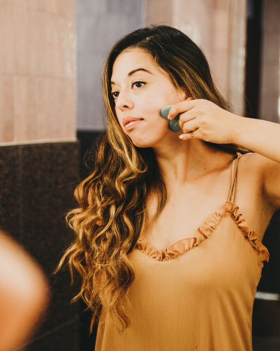 Using a gua sha stone at home