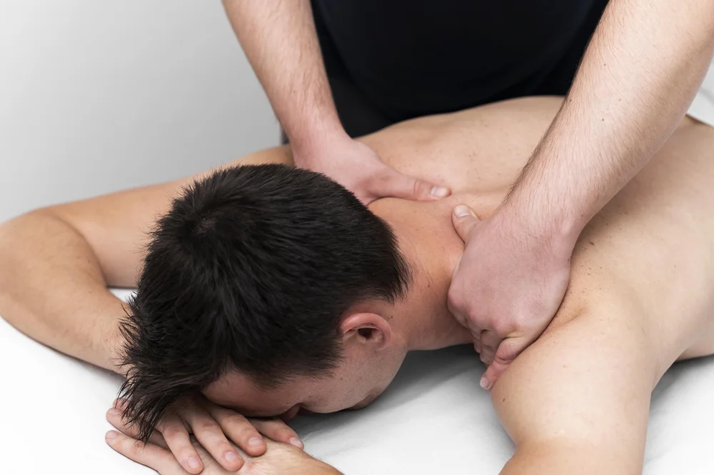 Massage therapy session at Saffron & Sage
