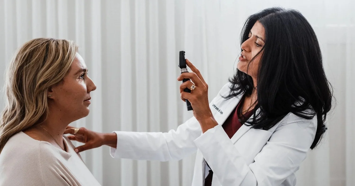 A Saffron & Sage doctor examining an executive during a baseline health assessment in San Diego