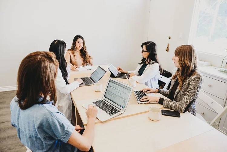 A team working around a table