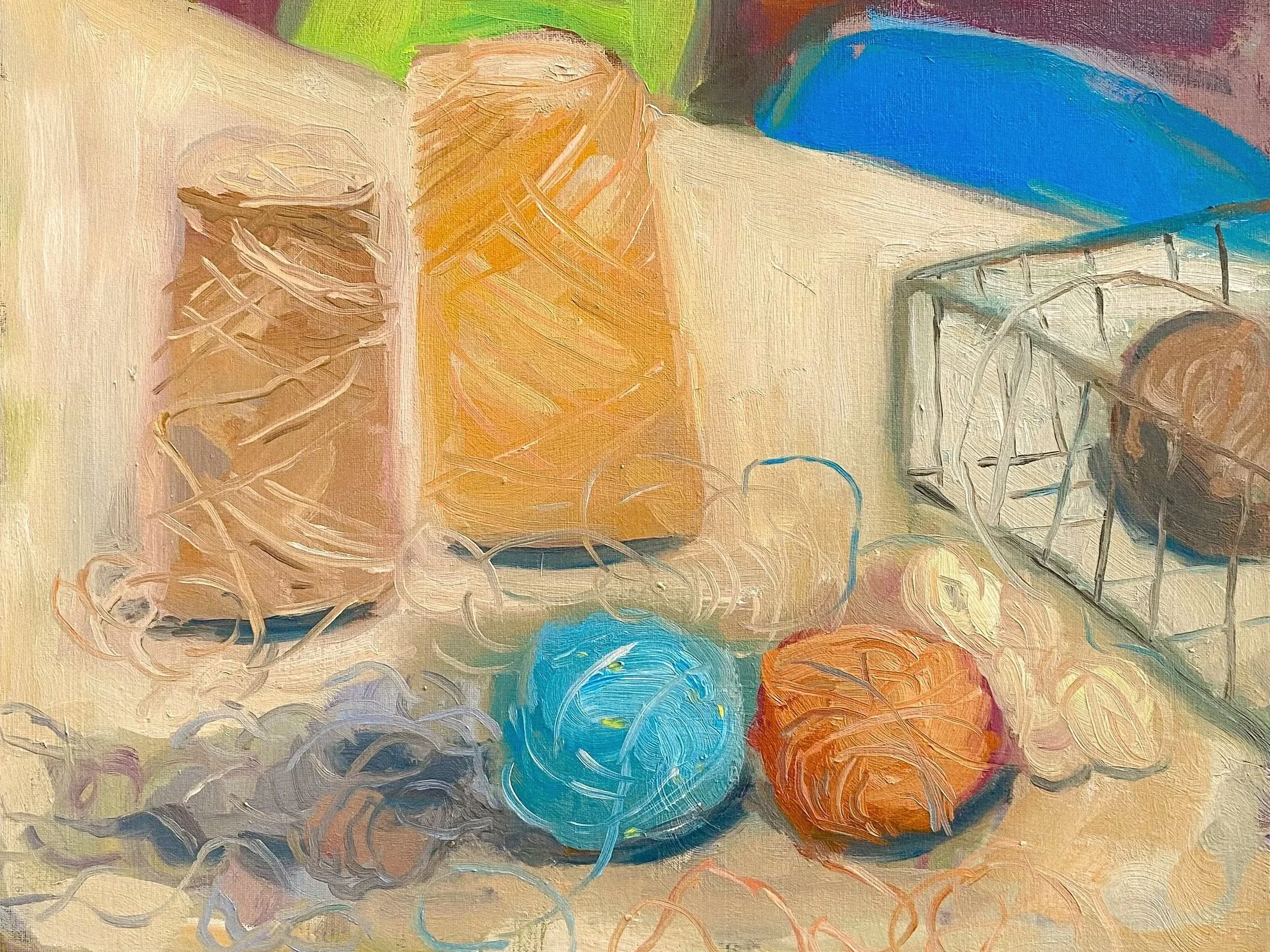 Colorful painting of a table with skeins of yarn, and a small wire basket, set against a multicolored background.