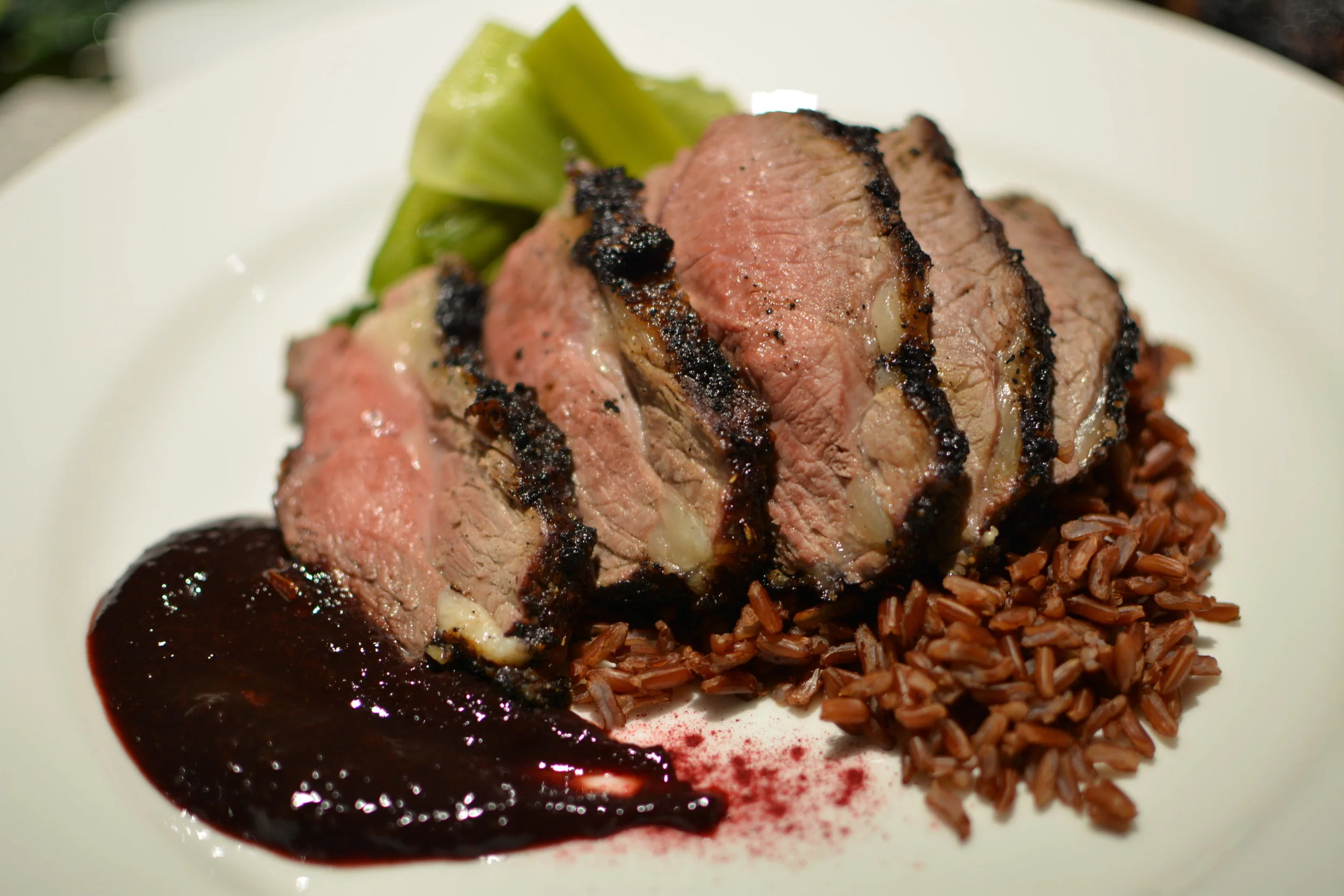BBQ leg of lamb, Fresh-AS Plum powder 5 spice crust, red rice & melted leeks. Plum sauce