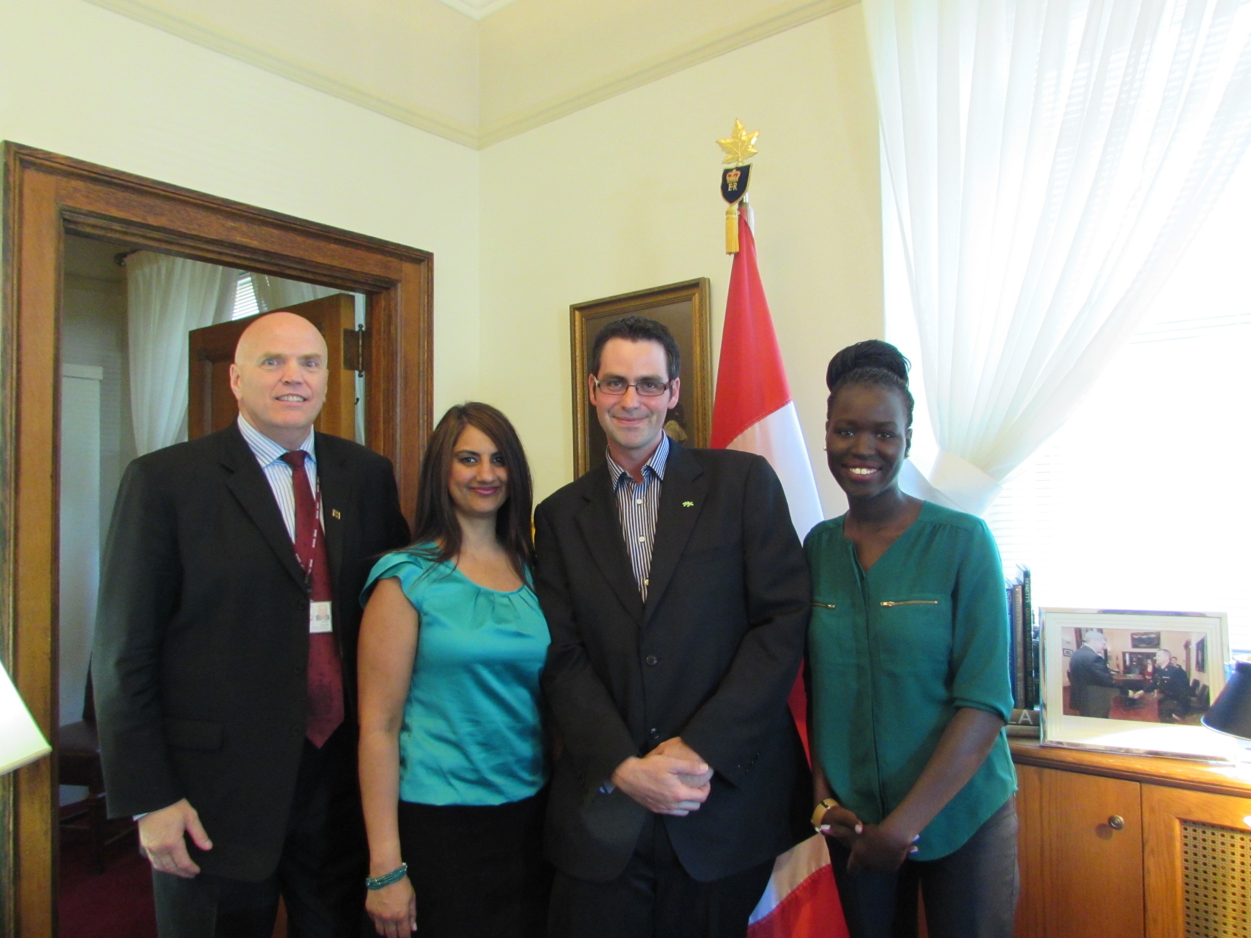 Senator Vern White, Adam Joiner (Manager at BGCO and former alumnus), Achan Akwai Cham (Recent graduate in Social Work and former alumnus)