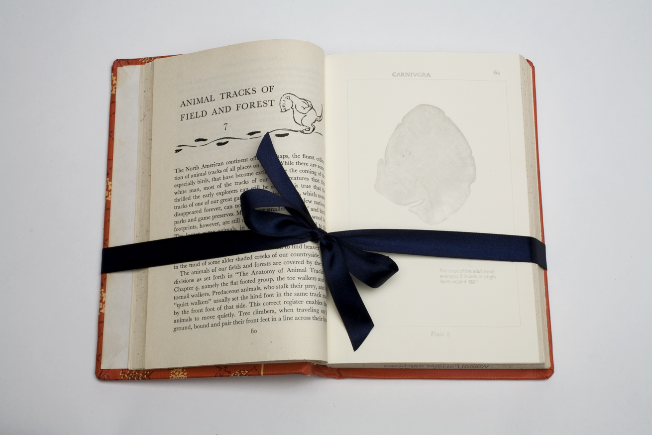 Heart-a-Track (detail), 2008. Silverpoint on paper, altered books, ribbon.