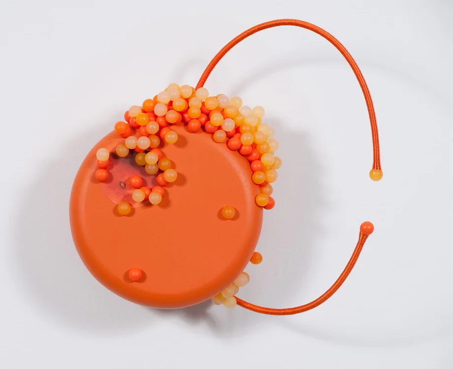 Untitled Lure (Orange with Cords), 2009. Mixed media, 10 x 9 x 6 in.