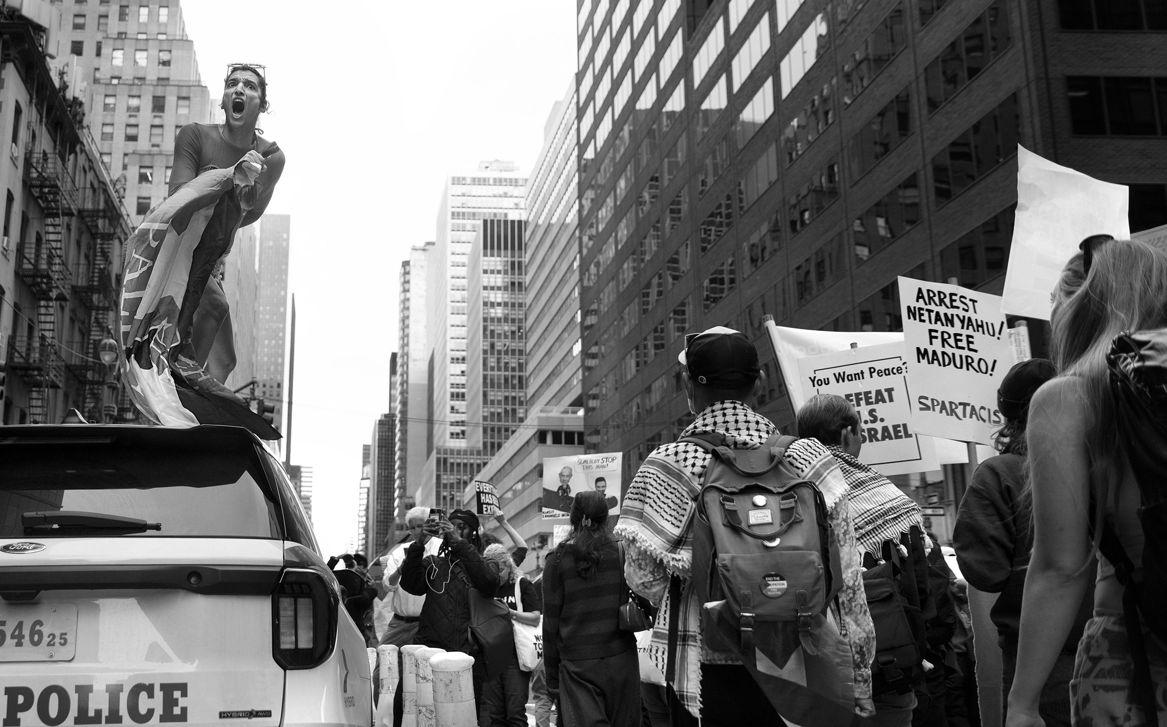 Demonstrator on NYPD Vehicle