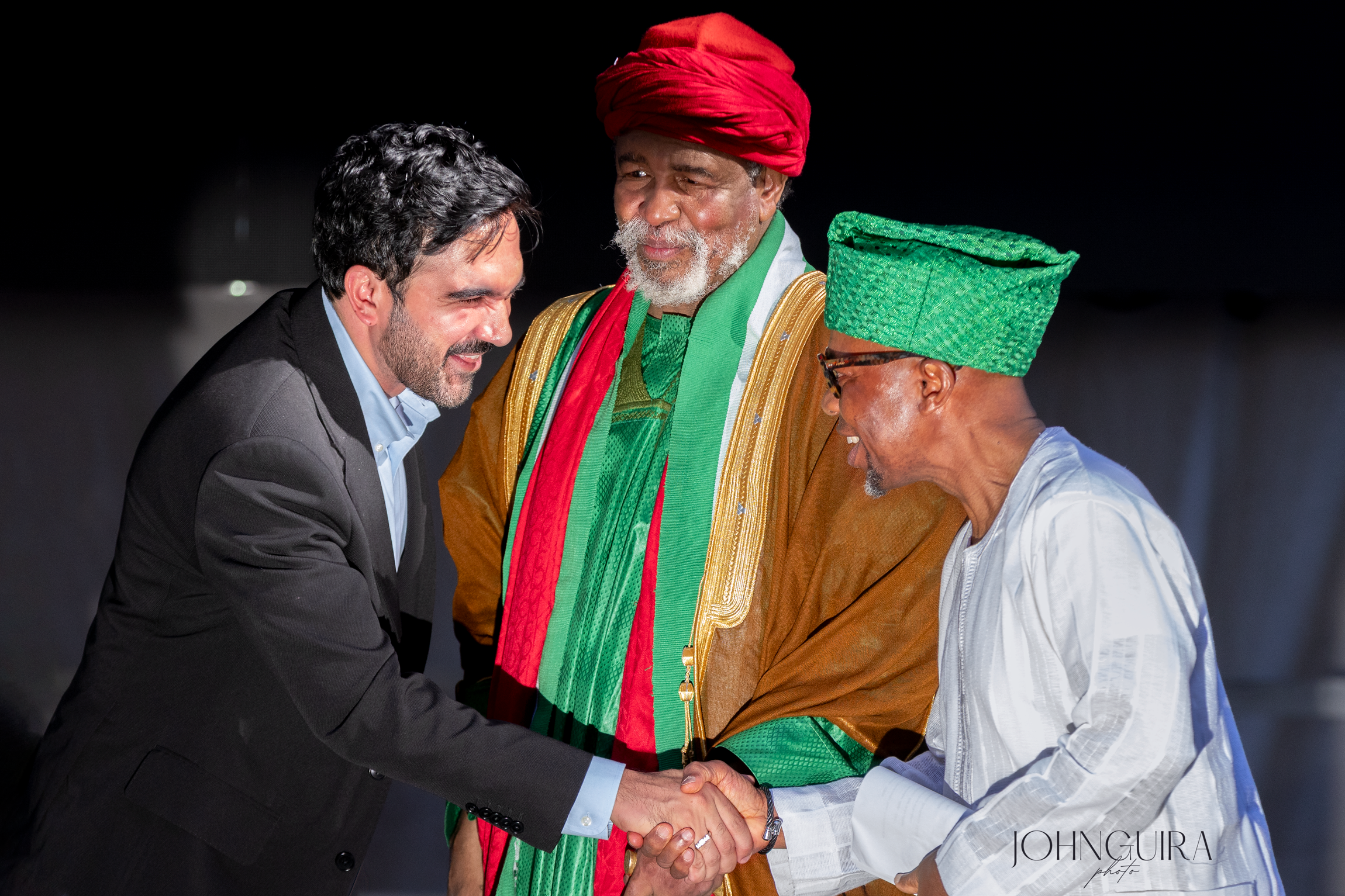 Mayor Zohran Mandani and the organizer shake hands