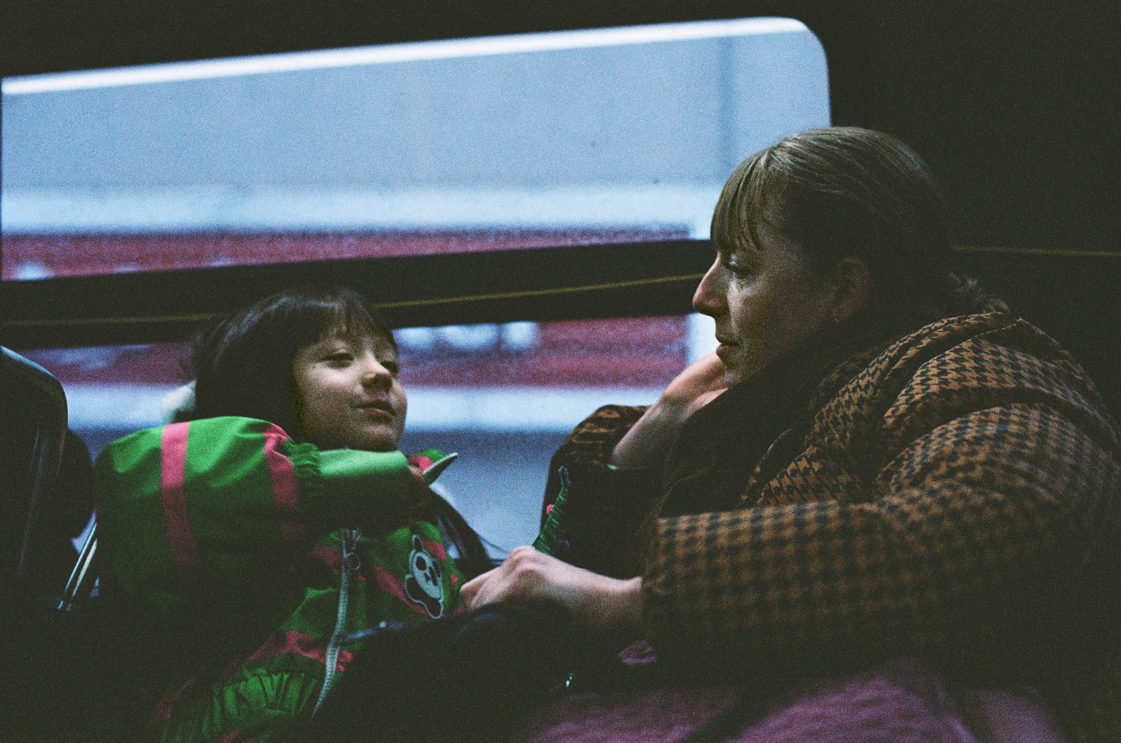 Woman-and-Girl-in-the-Train.png