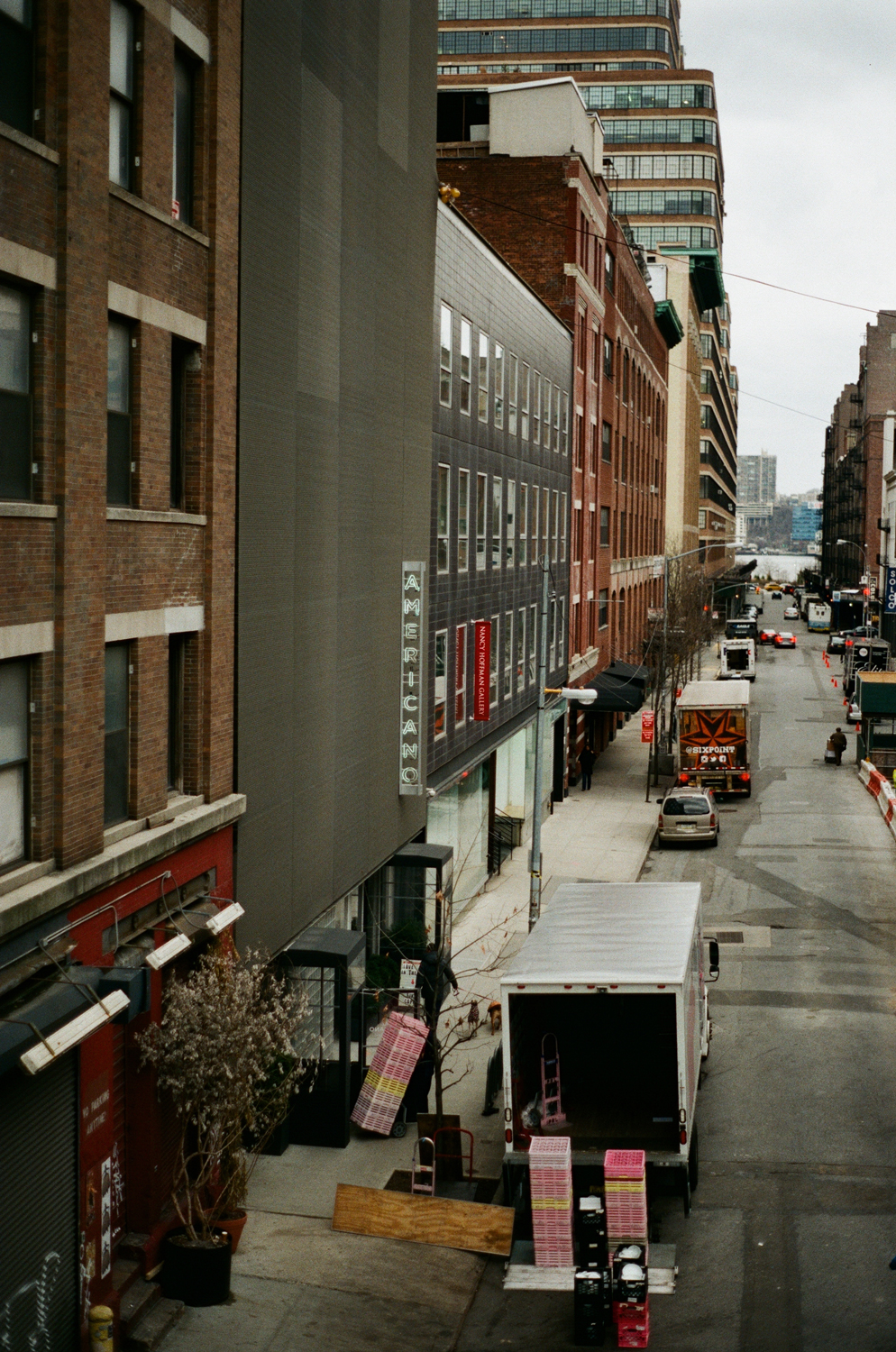 Walking the High Line for the first time. Spying on Hotel Americano which we would be staying at. Those pink crates!