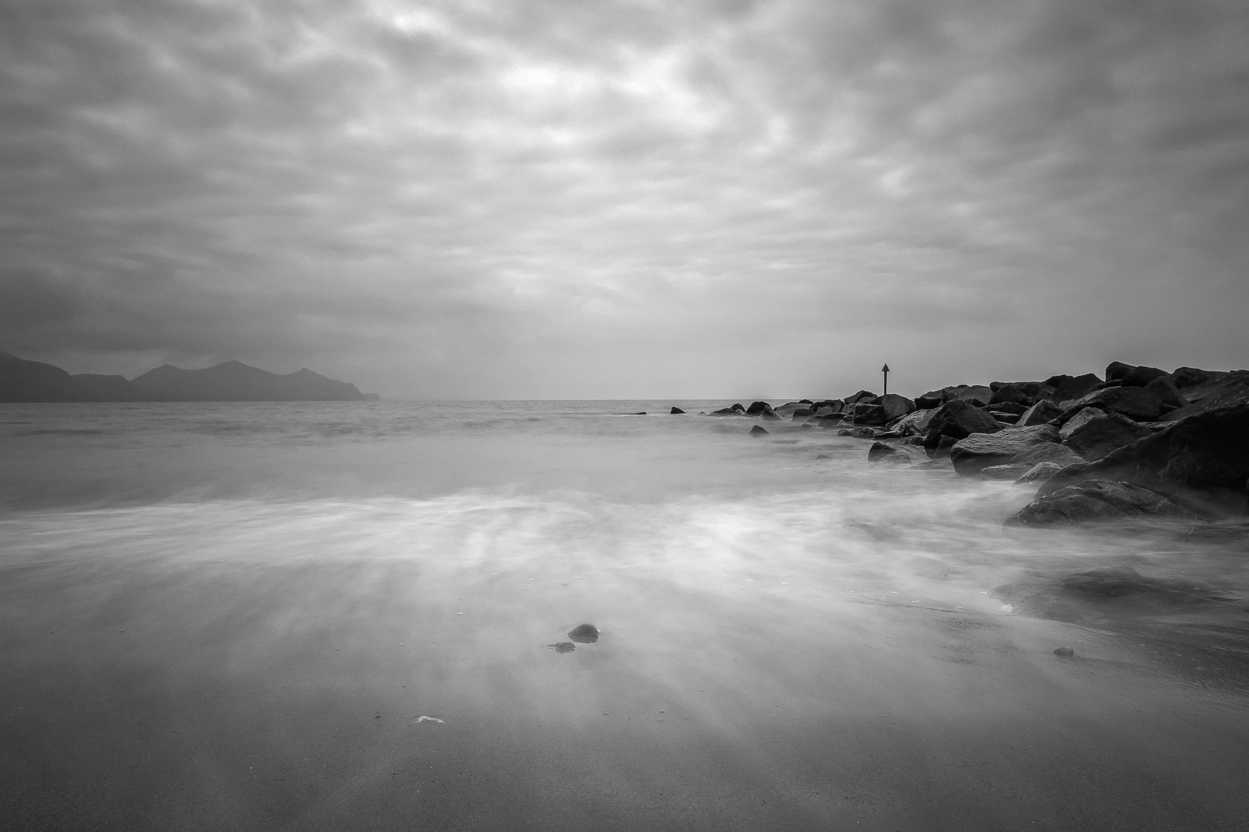 Dinas Dinelle - X-Pro1 + 18mm f/2 & B+W 110 ND Filter @ f/16. ISO200. 3.5 second exposure. Converted into monochrome in Lightroom.