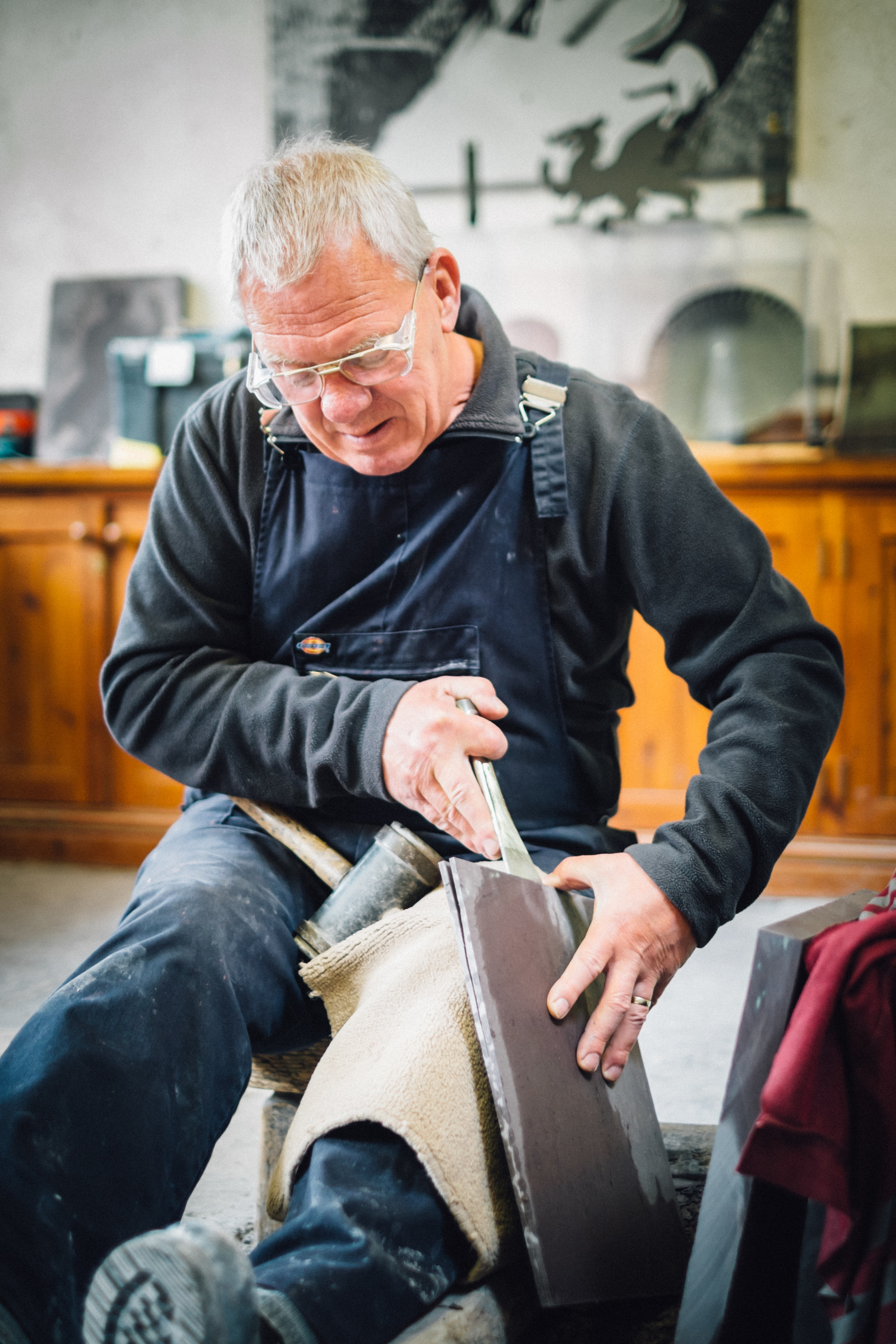 Slate splitting at the National Slate Museum. X-Pro1 + XF 35mm f/1.4 @ f/1.4. ISO500. 1/50