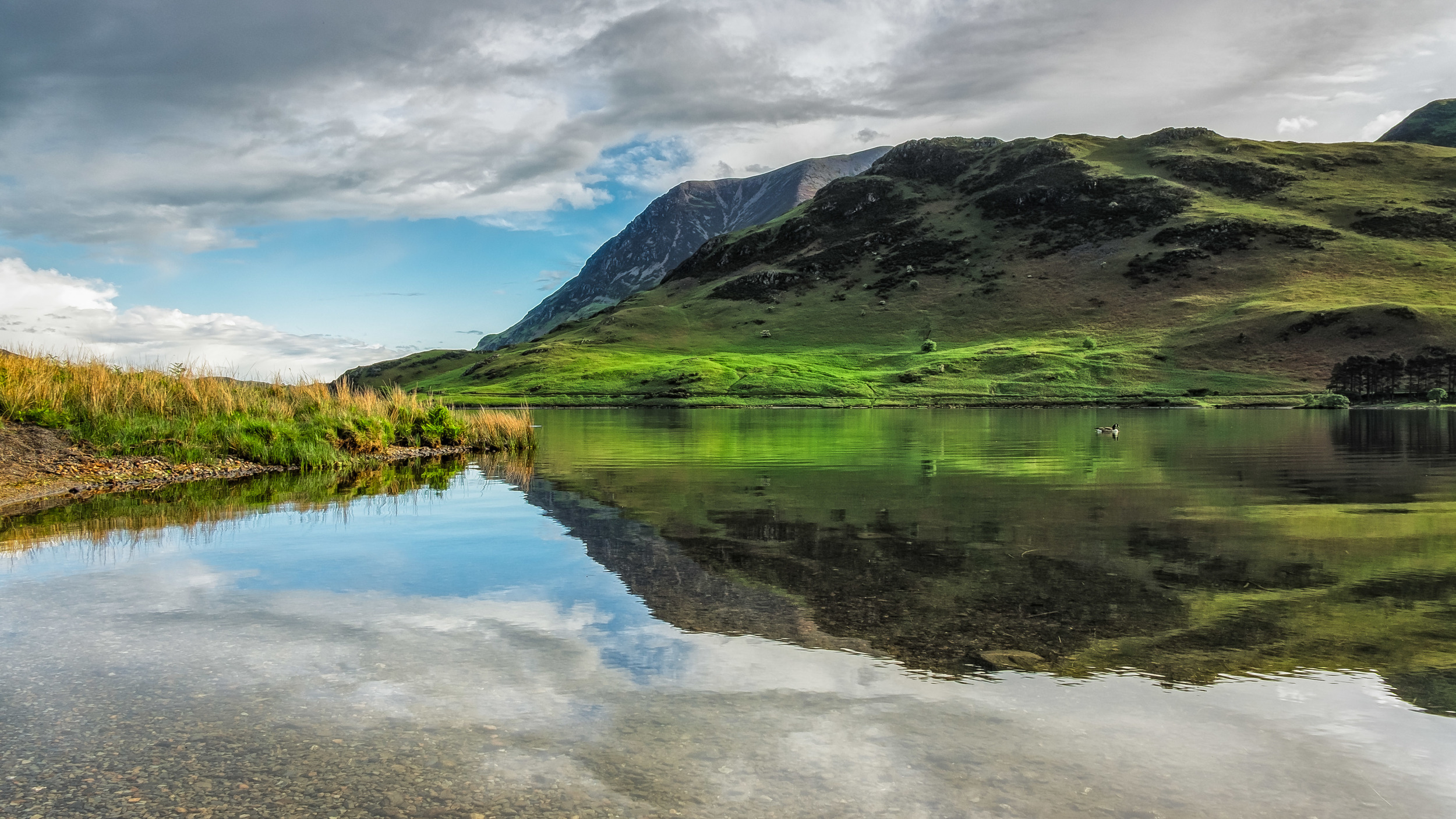 Crummock reflections. Fujifilm X-T1 + 18mm f/2 @ f/16. ISO200. 1/25.