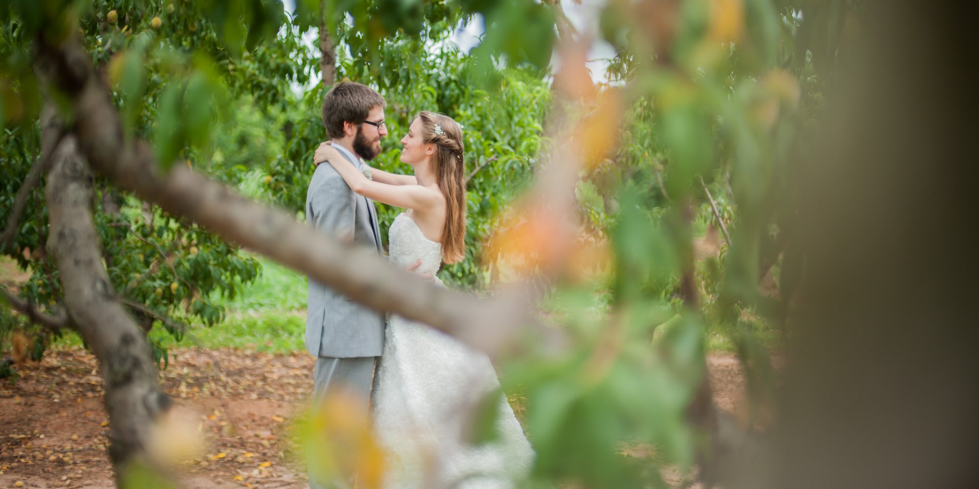 "Angela, put your arms around Josh's neck" and "Josh, put your hands on Angela's Waist" (Then the shot was taken peeping through the trees)