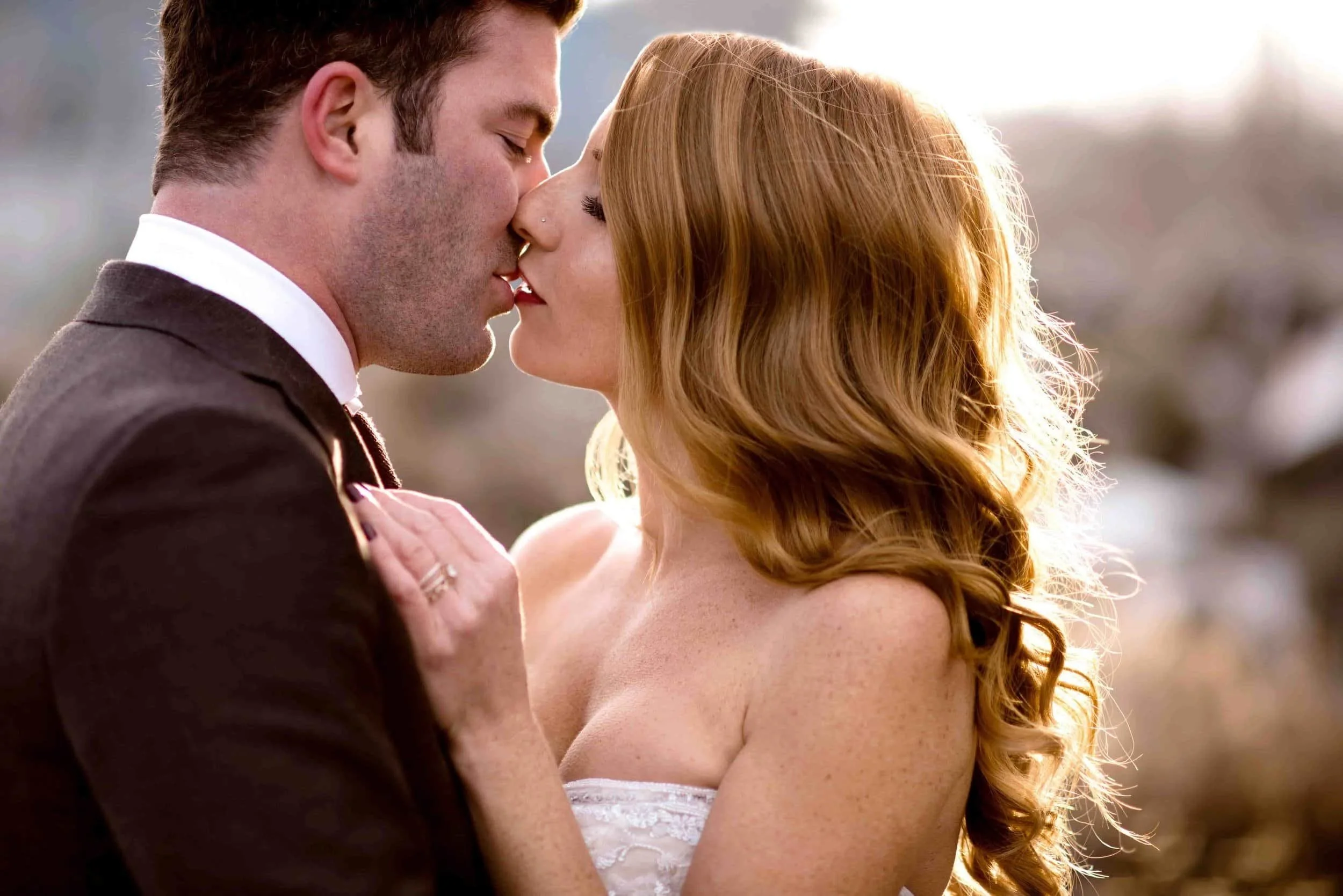 Close-up of bride and groom sharing a passionate kiss in Detroit