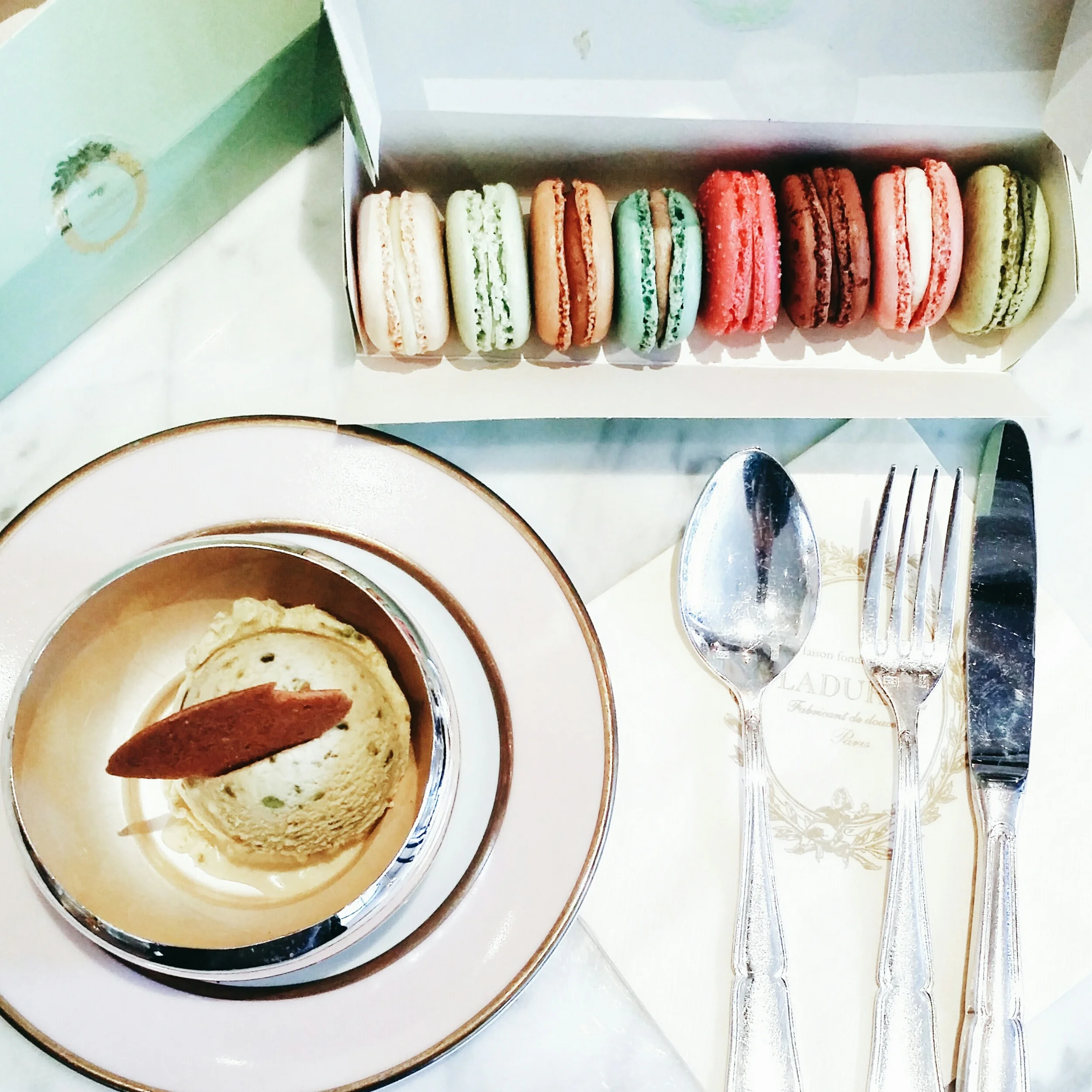 Pistachio ice cream & assortment of macarons.