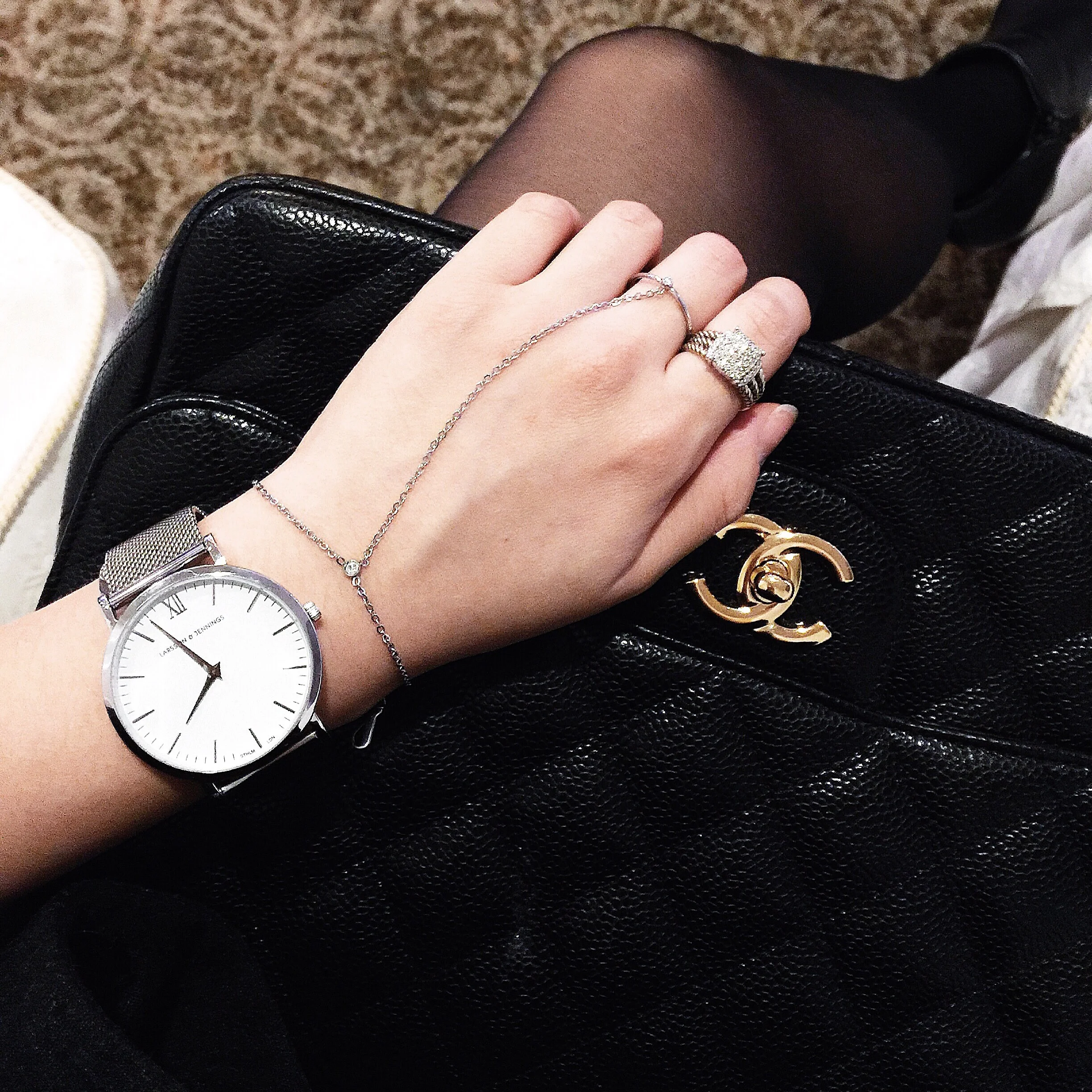 {L&J watch, Wanderlust + Co. chain ring bracelet, David Yurman ring, Chanel bag}